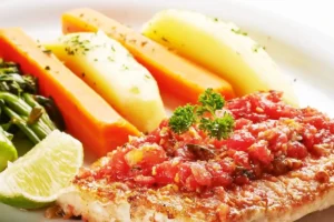 Saint Peter Napolitano - Filé de Saint Peter grelhado, coberto por cubos de tomates temperados com azeite, Viareggio Ristorante Chácara Santo Antônio.alho frito e manjericão. Acompanha cenouras, brócolis e batatas cozidas puxadas na manteiga. No almoço de segunda a sexta-feira (exceto feriados). Chácara Santo Antônio